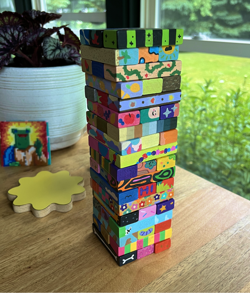 Stack of hand-painted Jenga blocks