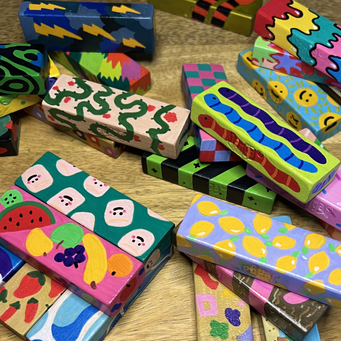 Drawing on Jenga blocks with markers