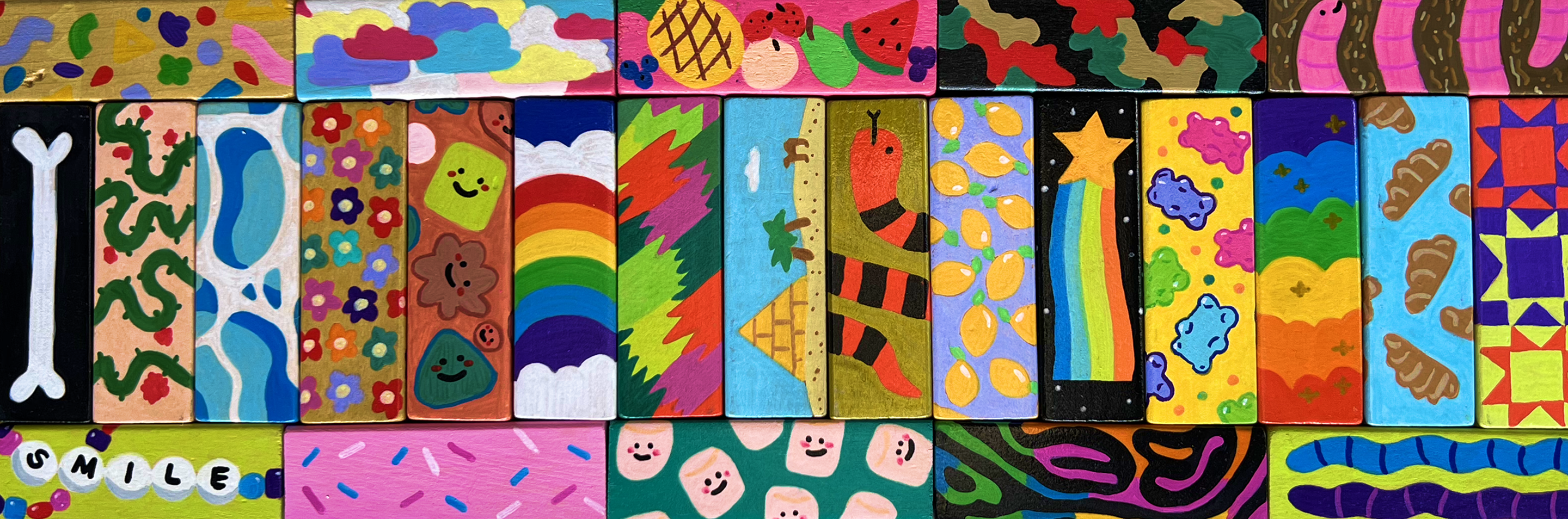 Hand-painted Jenga blocks spread out