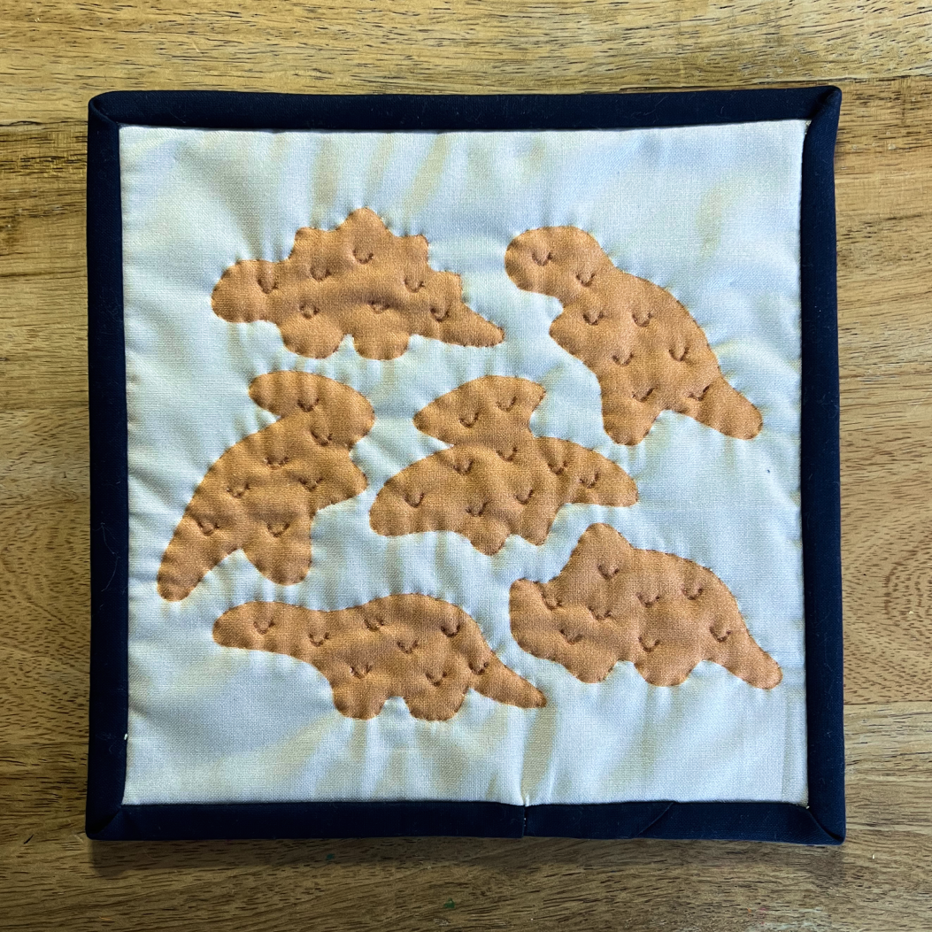Finished bound mini quilt